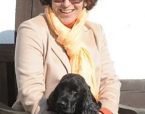 Judge Evi Eisenhardt pats the dog