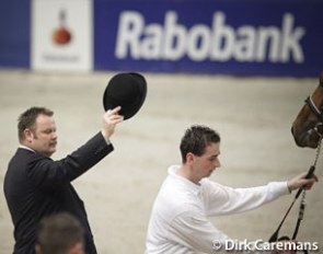 Ring master Johan Wilmink draws the stallions' attention at the KWPN Licensing :: Photo © Dirk Caremans