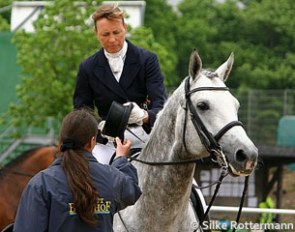 Nicole Casper getting dressed to compete