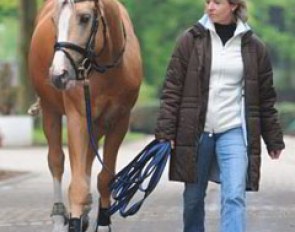 Jessica Krieg's trainer Stefanie Meyer-Biss walking Danilo