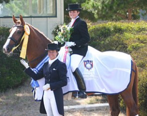 Susan Walker and Facet in the ribbons. Trainer Jennifer Hoffmann standing in front