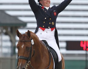 Fiona Bigwood is ecstatic about her ride and waves to the crowds. The grand stand was quite full on the first day of dressage competition. The bleachers stayed empty with all the rain. No problem, because the atmosphere was certainly there