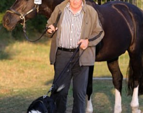 Hans Herzog with his Holsteiner stallion Le Noir and Australian shepherd Arielle