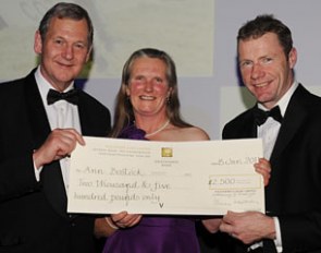 Ann Bostock receives the Runner-Up Prize in the SEIB & ROR Elite Performance Award for Dressage from David Buckton, Associate Director of SEIB, and former jockey, Mick Fitzgerald :: Photo © Trever Meeks