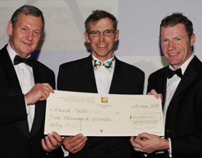 David Trott receives First Prize in the SEIB & ROR Elite Performance Award for Dressage from David Buckton, Associate Director of SEIB, and former jockey, Mick Fitzgerald :: Photo © Trever Meeks