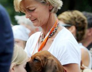 Ann Kathrin Linsenhoff with the latest acquisition to her family: a gorgeous Rhodesian Ridgeback puppy, apparently named Chewie