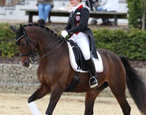 German young rider Nicola Krause warming up Rhythm Dance, who is originally named Ritti