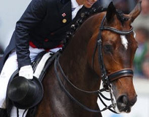 Steffen Peters pats Legolas after completing the Kur to Music at the 2013 CDIO Aachen :: Photo © Astrid Appels