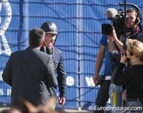 Roger Yves Bost gets interviewed by a tv crew