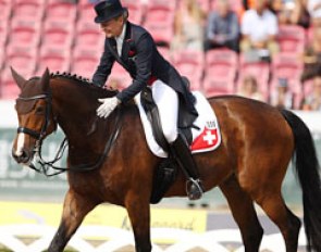 Marcela Krinke-Susmelj pats Molberg and leaves the arena in walk at the 2013 European Dressage Championships :: Photo © Astrid Appels