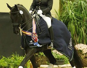 Heather Mason is one of the first riders to claim a national title at the inaugural 2013 U.S. Dressage Finals :: Photo © Sue Stickle