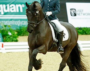 Emily O'Neill and her Frieisian Sir Lancelot won the Third level freestyle championship at the 2013 U.S Dressage Finals :: Photo © Sue Stickle