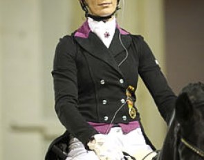 German Jana Kun preparing herself for the Grand Prix Knock Out, a show concept developed by the Helsinki Horse Show. Two riders show GP movements in mirror reflection and judges assess who can move to the next round.