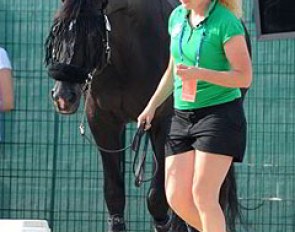 Groom Dagmar Kallenberg takes Totilas for a stroll