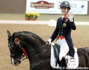 Charlotte Dujardin and Uthopia on winning form at the 2014 CDI Addington :: Photo © Risto Aaltonen