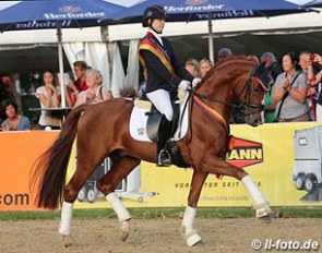 Anja Wilizmig and Sir Heinrich win the 6-year old dressage horse division at the 2014 Bundeschampionate :: Photo © LL-foto