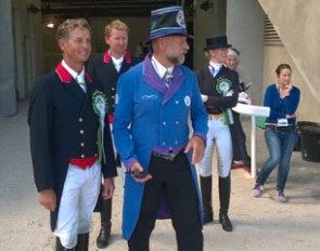 The Grand Prix prize giving with Carl Hester, Gareth Hughes, ring steward Pedro Cebulka and Nathalie zu Sayn-Wittgenstein