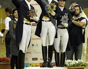 The kur to music top three at the 2014 CDI Doha: Patrik Kittel, Nathalie zu Sayn-Wittgenstein, and Lone Bang Larsen :: Photo © Libby Law