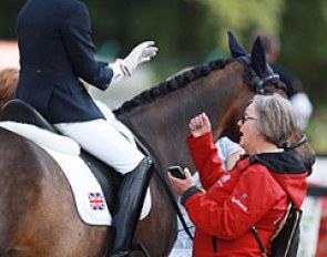 Danish chef d'equipe Rigmor Kristensen gives Phoebe Peters a pep talk