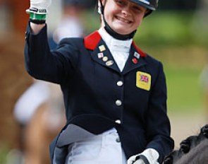 Phoebe Peters waves to her fans
