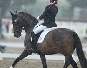 Phoebe Peters and SL Lucci rode during a big downpour of rain