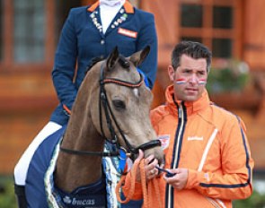 Lisanne Zoutendijk on Champ of Class, home trainer Jeroen Okkema cuddling the pony