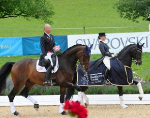 Steffen Peters on Legolas and Victoria Max-Theurer on her small tour horse Della Cavalleria in the lap of honour for the Grand Prix for Kur at the 2014 CDI Fritzens