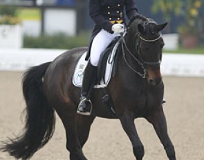 Former German pony team rider Svenja Meyer on Rania M. This horse has a very rhythmical piaffe-passage with super transition but overall could have more flexion in the joints. 