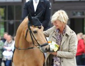 Show host Ann Kathrin Linsenhoff and her pony riding daughter Marie in the prize giving
