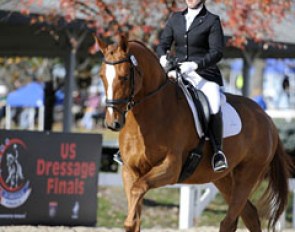 Amy Gimbel and Eye Candy (by Weltmeyer x UB40) win the Training Level Adult Amateur Championship at the 2014 U.S. Dressage Finals :: Photo © Sue Stickle