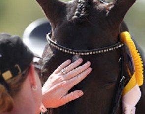 Rosa Cha W gets a pat before the prize giving ceremony