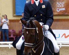 Charlie Hutton and Douglas IV in the lap of honour at the 2014 CDI Saumur :: Photo © Judy Peploe