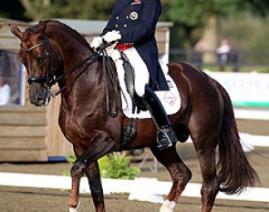 Silver medallists Carl Hester and Fine Time