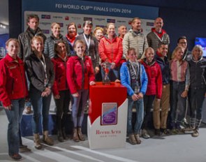 All 18 riders gathered for the draw for the first leg of the 2014 World Cup Final in Lyon, France with the Grand Prix. Standing to the left of the trophy is defending champion Helen Langehanenberg :: Photo © Dirk Caremans