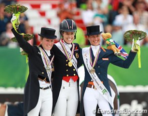 The kur to music podium at the 2014 World Equestrian Games: Helen Langehanenberg, Charlotte Dujardin, Adelinde Cornelissen :: Photo © Astrid Appels