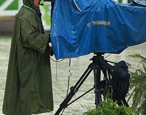 Tv media working in rainy weather conditions at the 2014 World Equestrian Games :: Photo © Astrid Appels