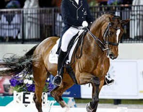Lars Petersen and Mariett win the World Cup qualifier kur to music at the 2014 CDI-W Wellington
