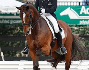 Lars Petersen and Mariett win the 4* Grand Prix at the 2014 CDI Wellington :: Photo © Sue Stickle