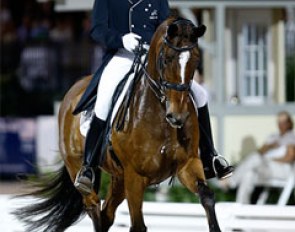 Lars Petersen and Mariett win the Grand Prix Kur 4* at the 2014 CDI Wellington :: Photo © Sue Stickle
