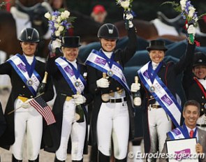 Team USA 1 wins the 2014 Wellington Nations' Cup: Silva Martin, Tina Konyot, Adrienne Lyle, and Shawna Harding wave their gold medals :: Photo © Astrid Appels