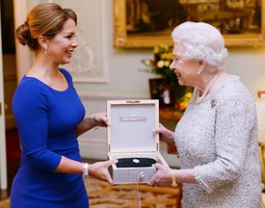 FEI President HRH Princess Haya  presents the FEI Lifetime Achievement Award to Her Majesty Queen Elizabeth II at a ceremony in Buckingham Palace in the presence of the Duke of Edinburgh Prince Phillip and BEF ChairKeith Taylor