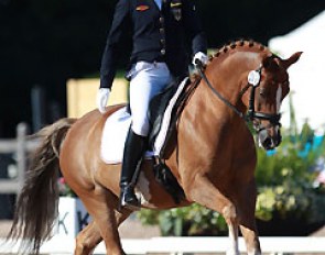 Lana Raumanns riding Den Ostriks Dailan with one hand in the canter for a while
