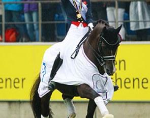 While the other dressage riders were too afraid to make a lap of honour on the wet grass, Dujardin couldn't be bothered and treated the audience to a wonderful tour around the stadium celebrating her gold medals