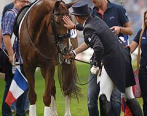 Pierre Volla pats Badinda Altena after their Grand Prix ride