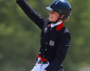 Charlotte Fry waves to her supporters