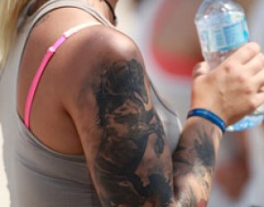 Groom with horse tattoo
