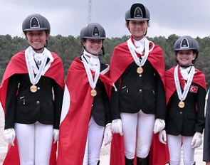 Turkey took the Children’s team title at the 2015 Balkan Dressage Championships in Istanbul, Turkey. On the podium: Yagmur Ozturk, Debora Haviyo, Irem Kaplan and Siraz Bayburtluoglu 