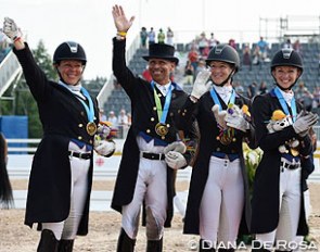 The U.S. team with Kimberly Herslow, Steffen Peters, Sabine Schut-Kery, and Laura Graves wins team gold at the 2015 Pan American Games :: Photo © Diana de Rosa