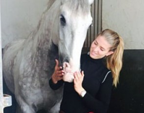 Morgan Barbançon cuddling her new ride Dragao in Portugal