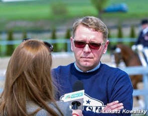Polish Grand Prix rider Tomasz Kowalski interviewed by the local tv-station